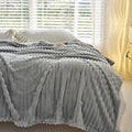 Couverture Plaid en Peluche Douce – Confort et Élégance pour Votre Maison