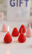 vegetable scented candles in the shape of a strawberry