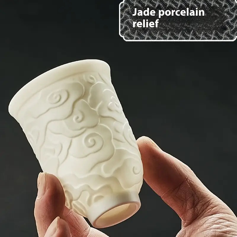 Tasse à Thé en Porcelaine Blanche avec Motif Nuageux Moiré – Élégance & Artisanat