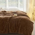 Couverture Plaid en Peluche Douce – Confort et Élégance pour Votre Maison