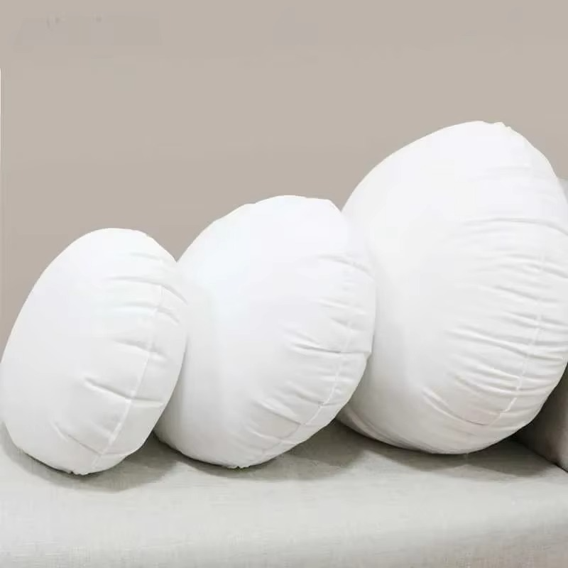 Coussin rond avec garnissage en coton PP