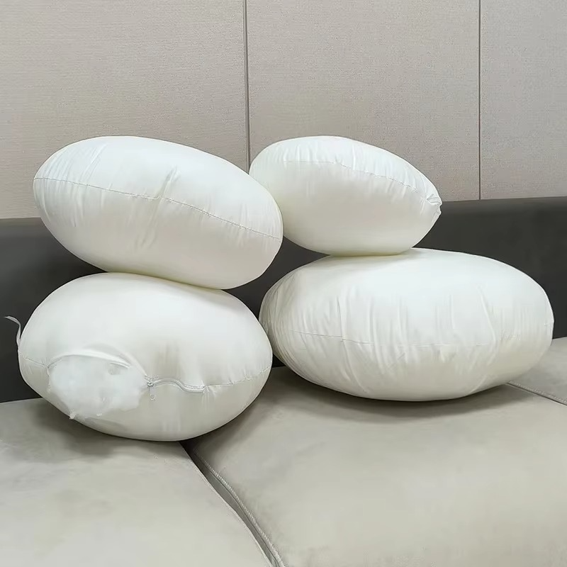 Coussin rond avec garnissage en coton PP