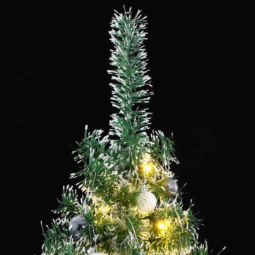 Sapin de Noël artificiel au feuillage floqué effet neige