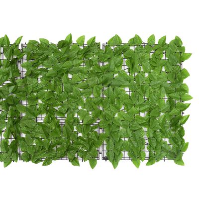 Balcony privacy screen with green leaves