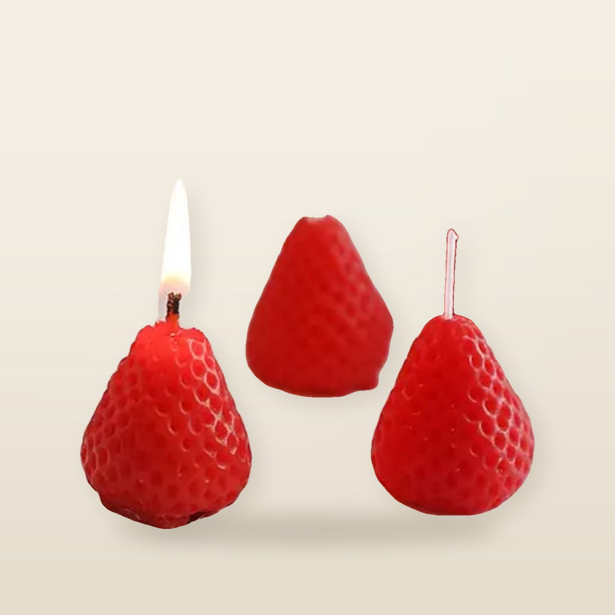 vegetable scented candles in the shape of a strawberry
